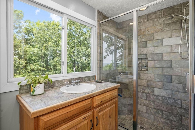 420 Cresthill Rd, Lynchburg, VA 24504 - bathroom featuring a stall shower, vanity, and a textured ceiling