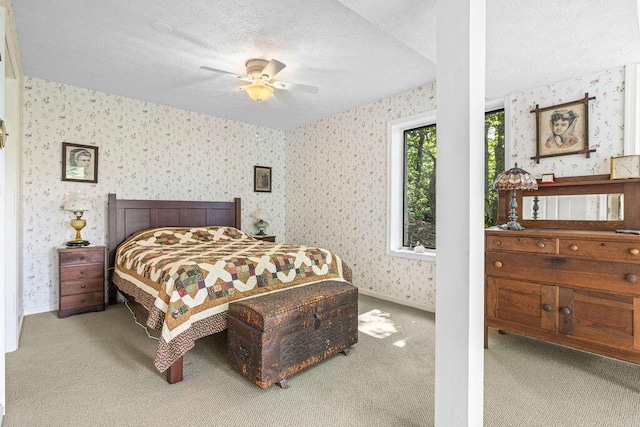 420 Cresthill Rd, Lynchburg, VA 24504 - carpeted bedroom with wallpapered walls, a textured ceiling, and a ceiling fan