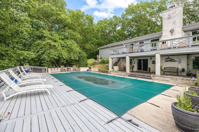 420 Cresthill Rd, Lynchburg, VA 24504 - view of pool featuring a deck, a covered pool, a patio, and view of wooded area