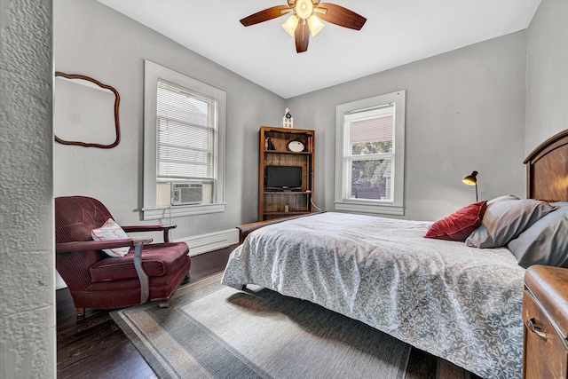 1521 Church Ave SE, Roanoke, VA 24013 - bedroom with wood finished floors, cooling unit, and ceiling fan