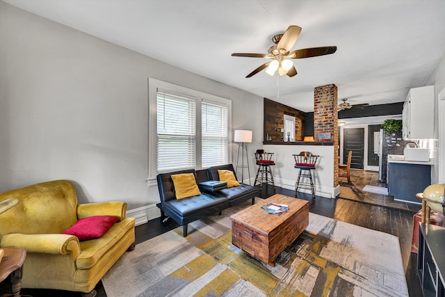 1521 Church Ave SE, Roanoke, VA 24013 - living room featuring a ceiling fan and dark wood-type flooring
