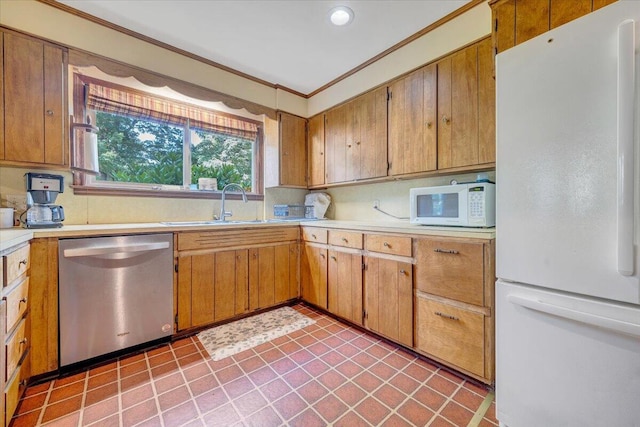 404 Robin Ridge Rd, Rocky Mount, VA 24151 - kitchen with white appliances, light countertops, crown molding, brown cabinetry, and recessed lighting