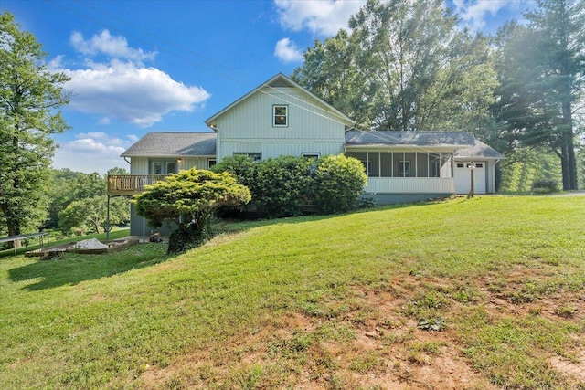 404 Robin Ridge Rd, Rocky Mount, VA 24151 - view of home's exterior featuring an attached garage, a sunroom, and a lawn
