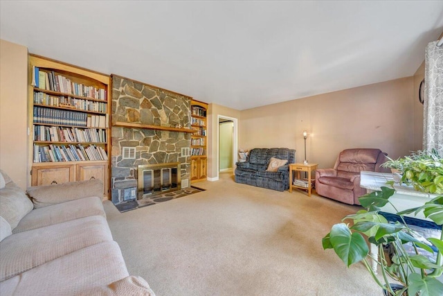 404 Robin Ridge Rd, Rocky Mount, VA 24151 - carpeted living room featuring a fireplace and built in shelves