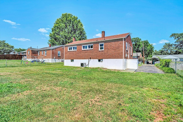 3113 Birchlawn Ave NW, Roanoke, VA 24012 - rear view of property with a chimney, brick siding, and a fenced backyard