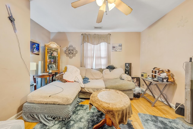 1406 Melrose Ave NW, Roanoke, VA 24017 - living area with wood finished floors and ceiling fan