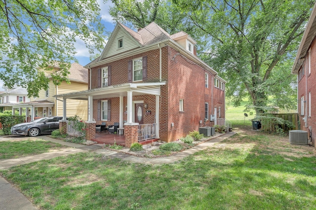 1406 Melrose Ave NW, Roanoke, VA 24017 - traditional style home with a porch, brick siding, and a front lawn