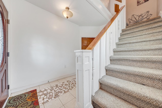 1406 Melrose Ave NW, Roanoke, VA 24017 - staircase with tile patterned flooring and baseboards