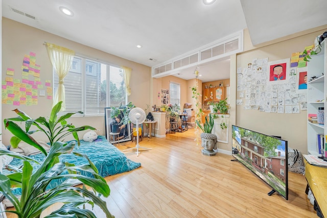 1406 Melrose Ave NW, Roanoke, VA 24017 - living room featuring wood finished floors and recessed lighting