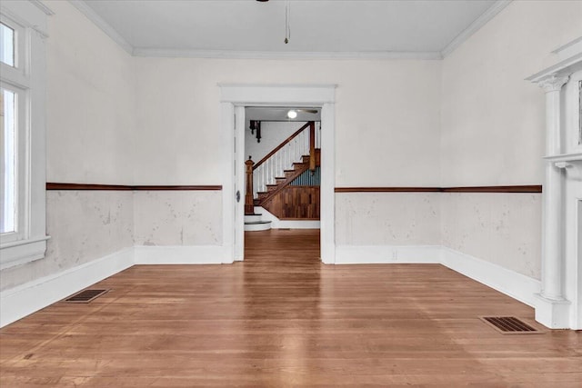 610 18th St SE, Roanoke, VA 24013 - spare room with wood finished floors, stairs, and crown molding