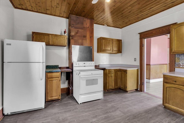610 18th St SE, Roanoke, VA 24013 - kitchen with white appliances, wood ceiling, wood finished floors, and brown cabinets