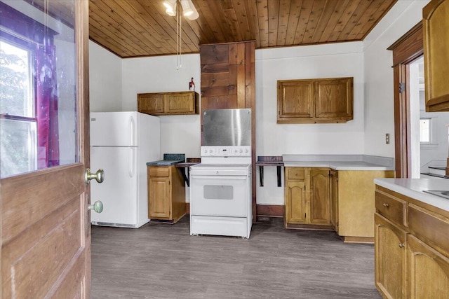 610 18th St SE, Roanoke, VA 24013 - kitchen with white appliances, wooden ceiling, brown cabinetry, dark wood-type flooring, and light countertops
