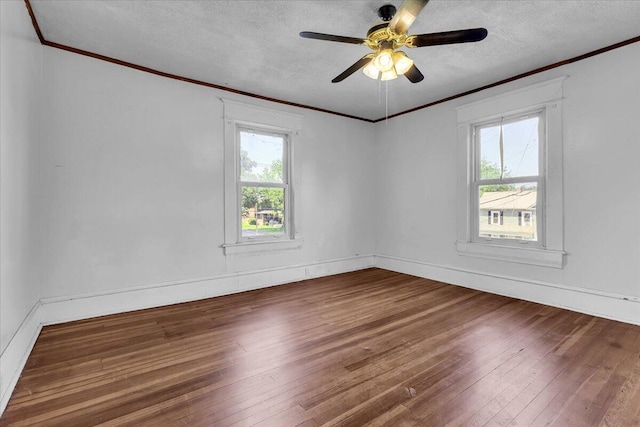 610 18th St SE, Roanoke, VA 24013 - empty room with crown molding, hardwood / wood-style flooring, a textured ceiling, and a ceiling fan