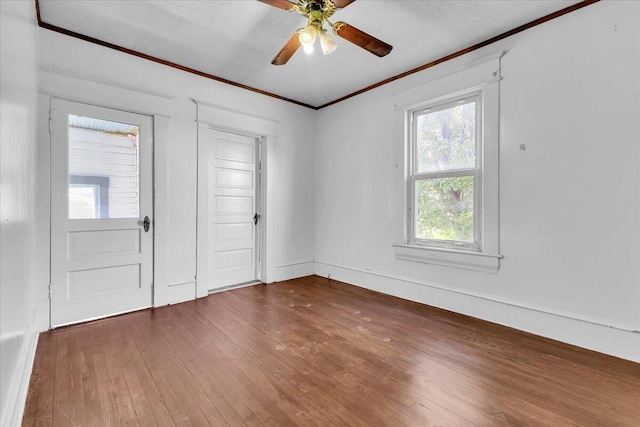 610 18th St SE, Roanoke, VA 24013 - empty room with ornamental molding, hardwood / wood-style floors, and ceiling fan