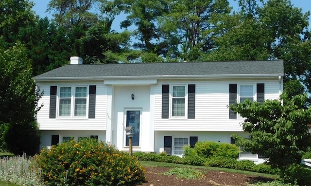 4029 Kentland Dr, Roanoke, VA 24018 - split foyer home featuring stucco siding and a chimney