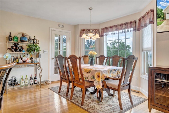 17 Dudley Creek Rd, Hardy, VA 24101 - dining area with a chandelier, plenty of natural light, and light wood-style floors