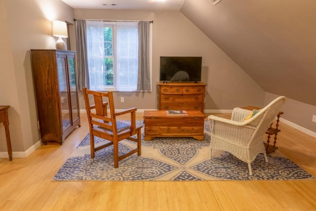 115 Armistead Ln, Rustburg, VA 24588 - sitting room with wood finished floors and lofted ceiling