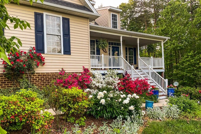 115 Armistead Ln, Rustburg, VA 24588 - view of front facade featuring a porch and stairs