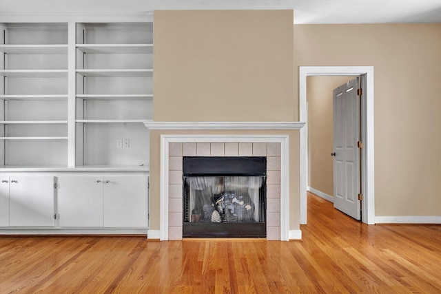 6820 Dawnwood Rd, Roanoke, VA 24018 - detailed view of wood finished floors and a tiled fireplace