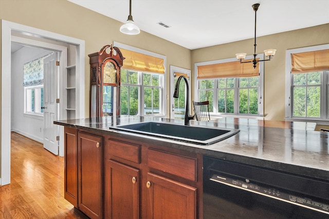 6820 Dawnwood Rd, Roanoke, VA 24018 - kitchen with black dishwasher, plenty of natural light, and decorative light fixtures
