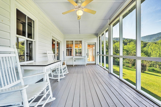 6820 Dawnwood Rd, Roanoke, VA 24018 - unfurnished sunroom with ceiling fan and a mountain view