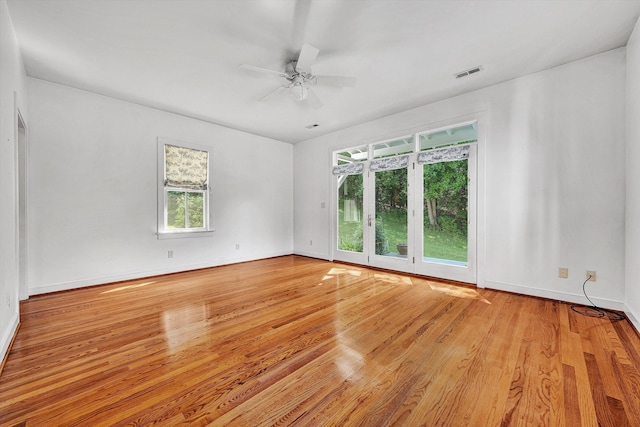 6820 Dawnwood Rd, Roanoke, VA 24018 - unfurnished room with plenty of natural light, a ceiling fan, and wood finished floors