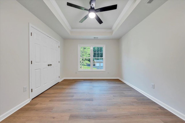 2315 Vale Ave, Roanoke, VA 24012 - unfurnished room featuring a raised ceiling, ornamental molding, wood finished floors, and a ceiling fan