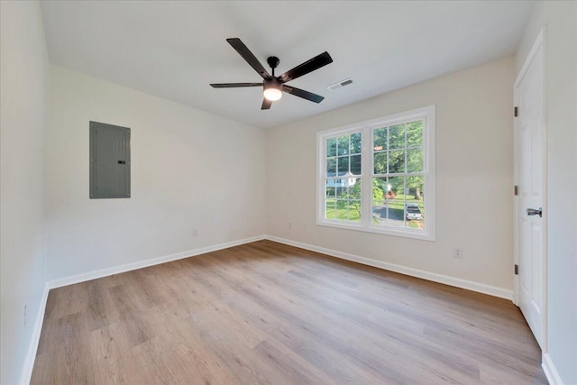 2315 Vale Ave, Roanoke, VA 24012 - unfurnished room with electric panel, wood finished floors, and ceiling fan