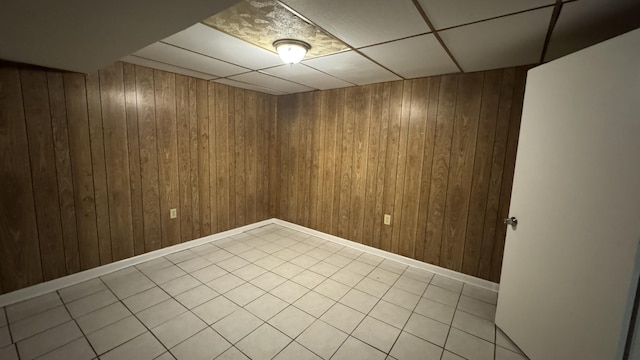 2315 Meadowbrook Rd NW, Roanoke, VA 24017 - unfurnished room with wood walls and light tile patterned floors
