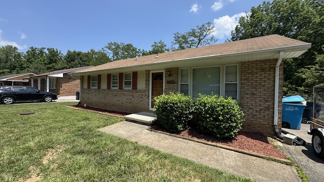 2315 Meadowbrook Rd NW, Roanoke, VA 24017 - single story home with brick siding, a front lawn, and a shingled roof