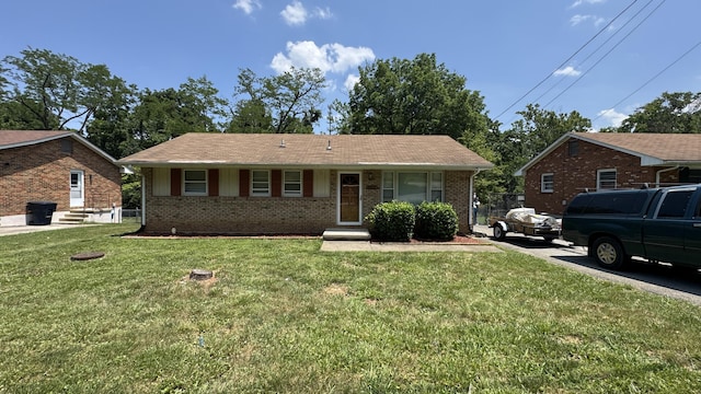 2315 Meadowbrook Rd NW, Roanoke, VA 24017 - view of front of property with brick siding, a front yard, and entry steps