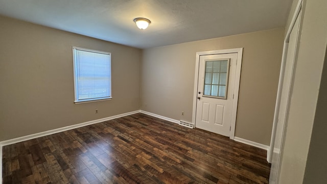 2315 Meadowbrook Rd NW, Roanoke, VA 24017 - spare room with dark wood-style floors and baseboards