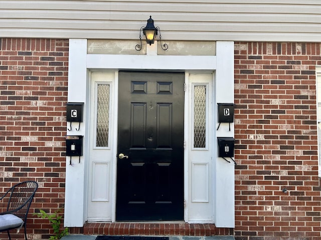 426 Walnut Ave SE, Roanoke, VA 24014 - property entrance with brick siding