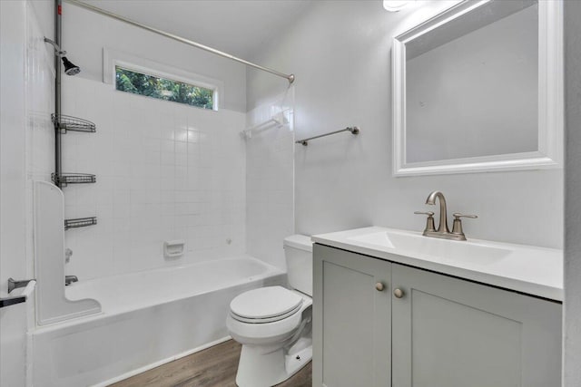 309 Mcclelland St, Salem, VA 24153 - bathroom featuring vanity, washtub / shower combination, and wood finished floors