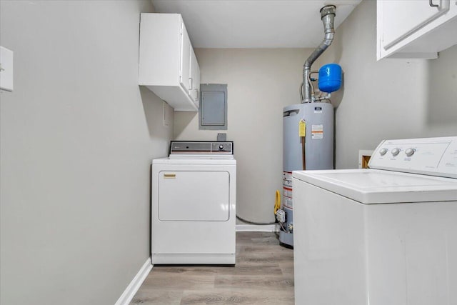 309 Mcclelland St, Salem, VA 24153 - laundry room featuring cabinet space, separate washer and dryer, gas water heater, electric panel, and light wood-type flooring