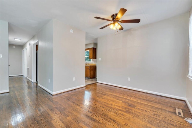 309 Mcclelland St, Salem, VA 24153 - empty room featuring a ceiling fan and wood finished floors
