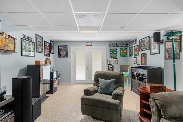 4575 Nelms Ln NE, Roanoke, VA 24019 - living area with a paneled ceiling, light carpet, and french doors
