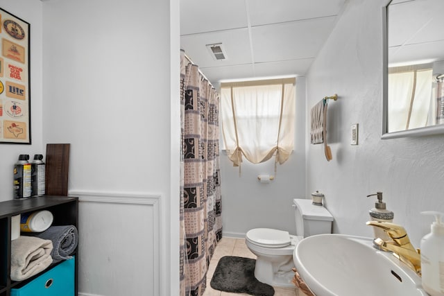 4575 Nelms Ln NE, Roanoke, VA 24019 - bathroom with tile patterned flooring, a drop ceiling, and a shower with curtain