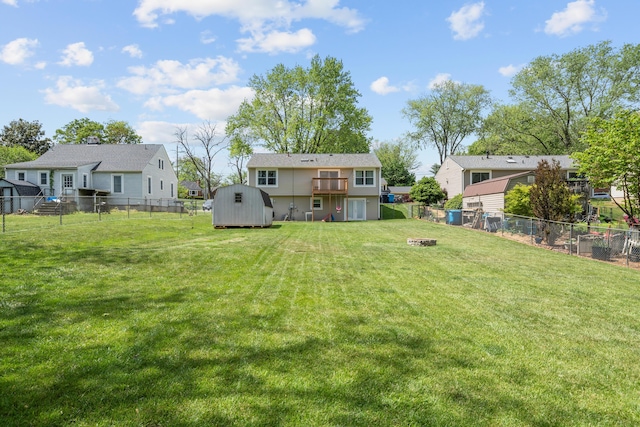 4575 Nelms Ln NE, Roanoke, VA 24019 - fenced backyard with a storage shed, an outdoor fire pit, a residential view, and a wooden deck