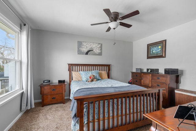 4575 Nelms Ln NE, Roanoke, VA 24019 - bedroom with multiple windows, carpet floors, and a ceiling fan