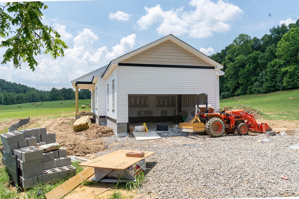 3086 Haymakertown Rd, Troutville, VA 24175 - view of side of property featuring an outdoor structure and a forest view