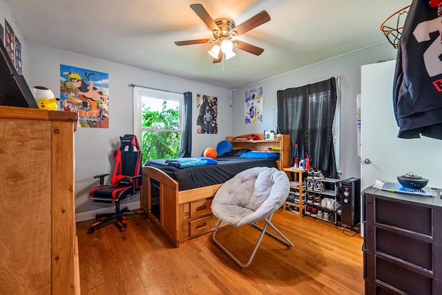 473 Hemlock Rd, Salem, VA 24153 - bedroom with light wood finished floors and a ceiling fan