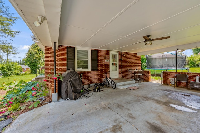 473 Hemlock Rd, Salem, VA 24153 - view of patio with a trampoline, ceiling fan, and a carport