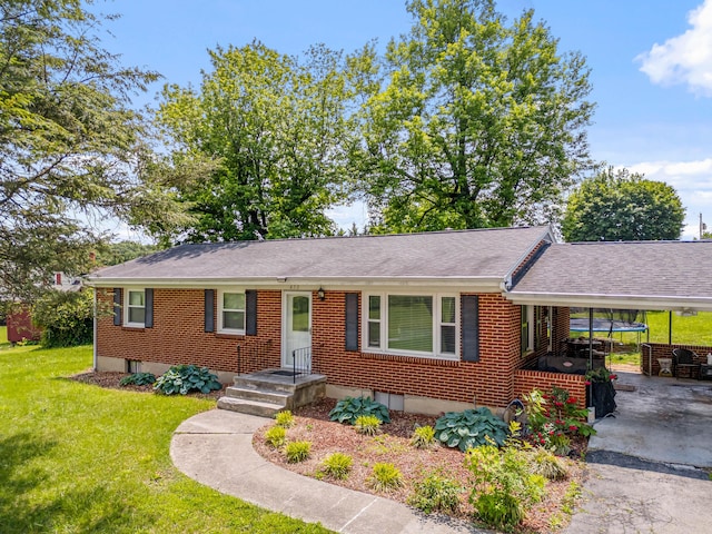 473 Hemlock Rd, Salem, VA 24153 - ranch-style house with a front yard, a carport, brick siding, and a shingled roof