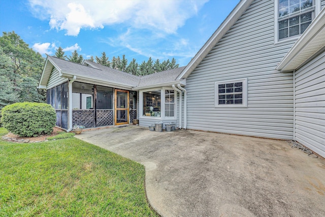 1941 Springmill Rd, Salem, VA 24153 - rear view of property with a sunroom, a patio, and a yard