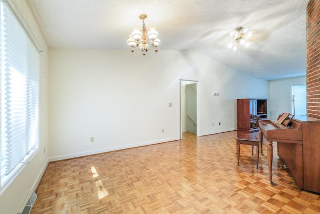75 Eleanor Ln, Blue Ridge, VA 24064 - living area with vaulted ceiling, plenty of natural light, a chandelier, a textured ceiling, and ceiling fan