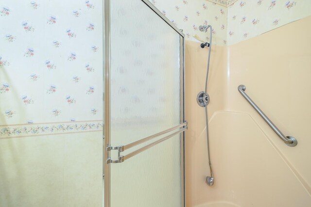 75 Eleanor Ln, Blue Ridge, VA 24064 - bathroom featuring wallpapered walls and a shower stall