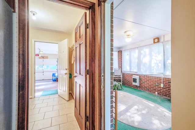 75 Eleanor Ln, Blue Ridge, VA 24064 - corridor with brick wall, heating unit, and light tile patterned floors