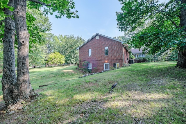 75 Eleanor Ln, Blue Ridge, VA 24064 - view of home's exterior featuring brick siding and a lawn