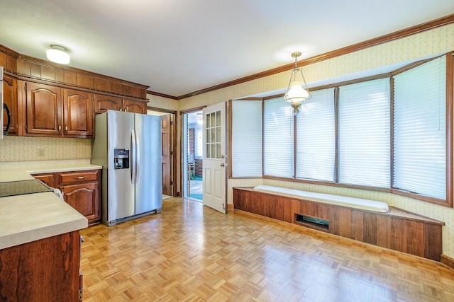 75 Eleanor Ln, Blue Ridge, VA 24064 - kitchen featuring stainless steel fridge, wallpapered walls, light countertops, plenty of natural light, and decorative light fixtures
